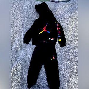 Black air Jordan sweat suit.
